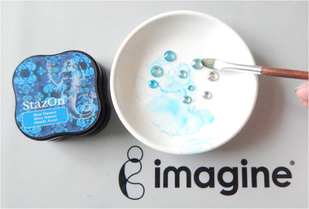 I decided to paint some of the rhinestones with the StazOn ink in Blue Hawaii
